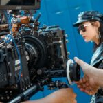 Close-up of a professional video production setup on an outdoor film set.